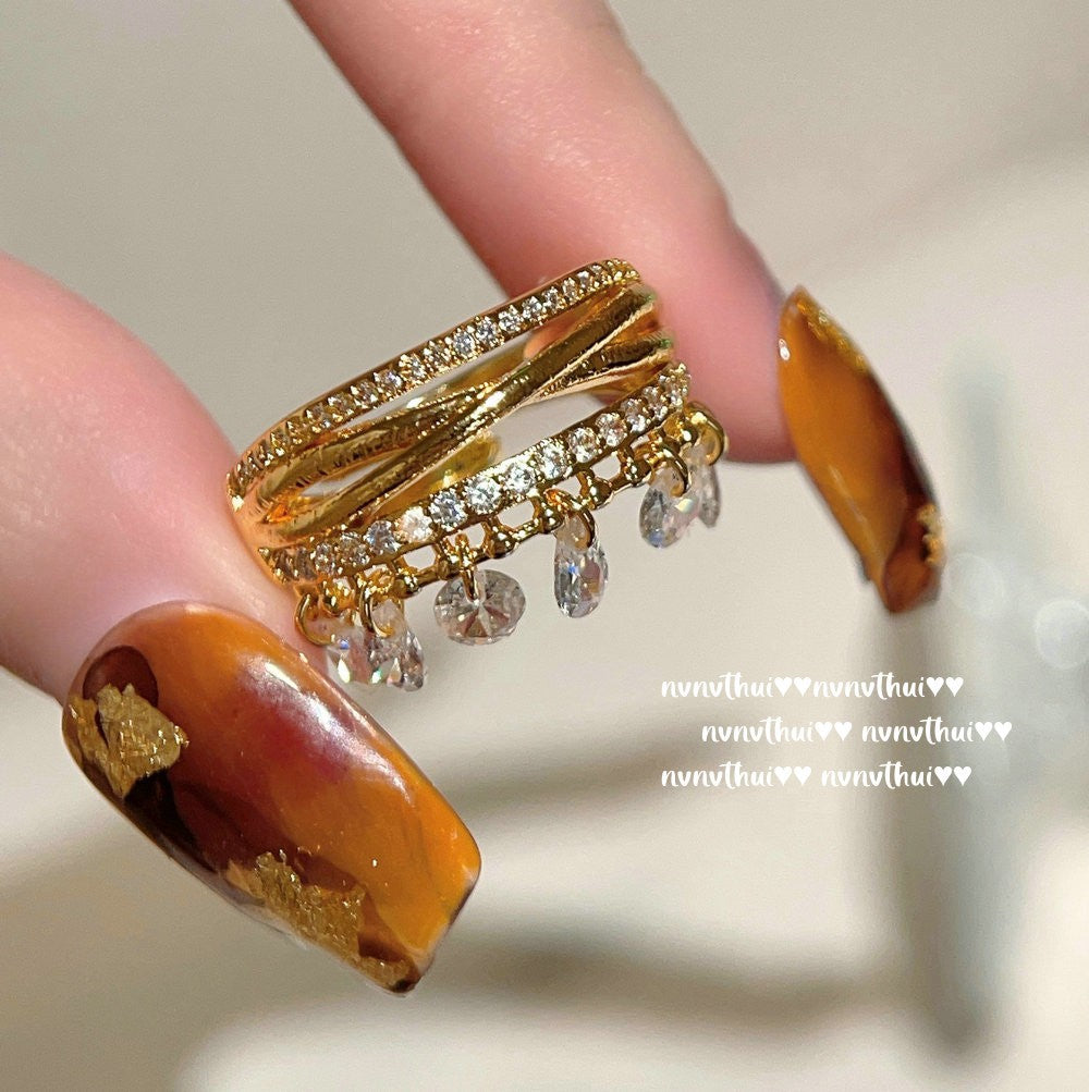 2021ZZ Brushed Interlaced Teardrop Zirconia Open Ring