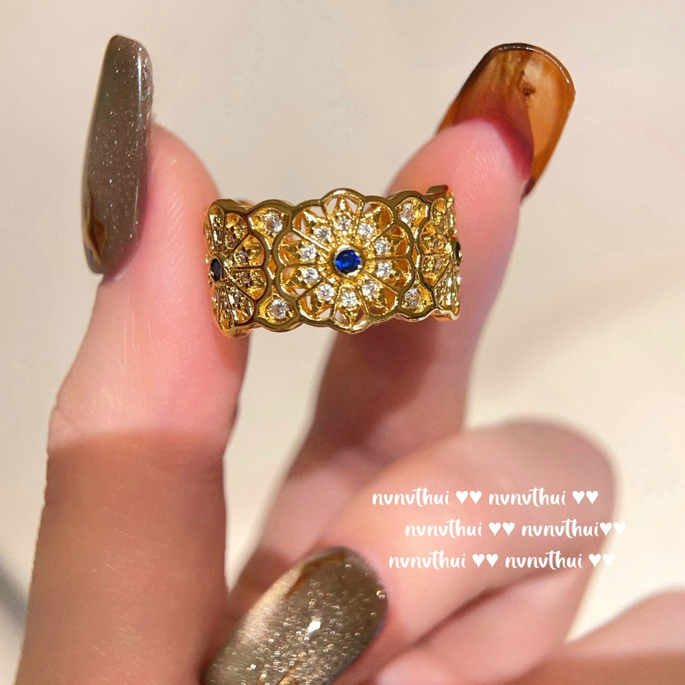 424NV Lattice Blue Zirconia Floral Petal Open Ring