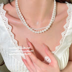 354BB Mixed Sizes Artificial Shell Pearl Twisted Necklace