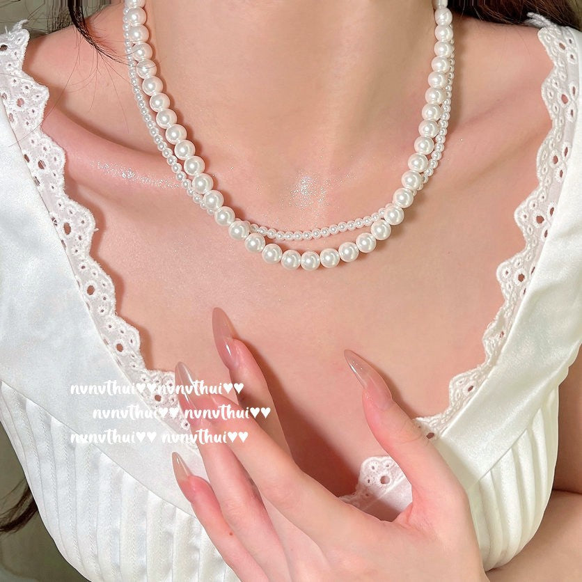 354BB Mixed Sizes Artificial Shell Pearl Twisted Necklace