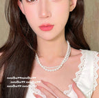 354BB Mixed Sizes Artificial Shell Pearl Twisted Necklace